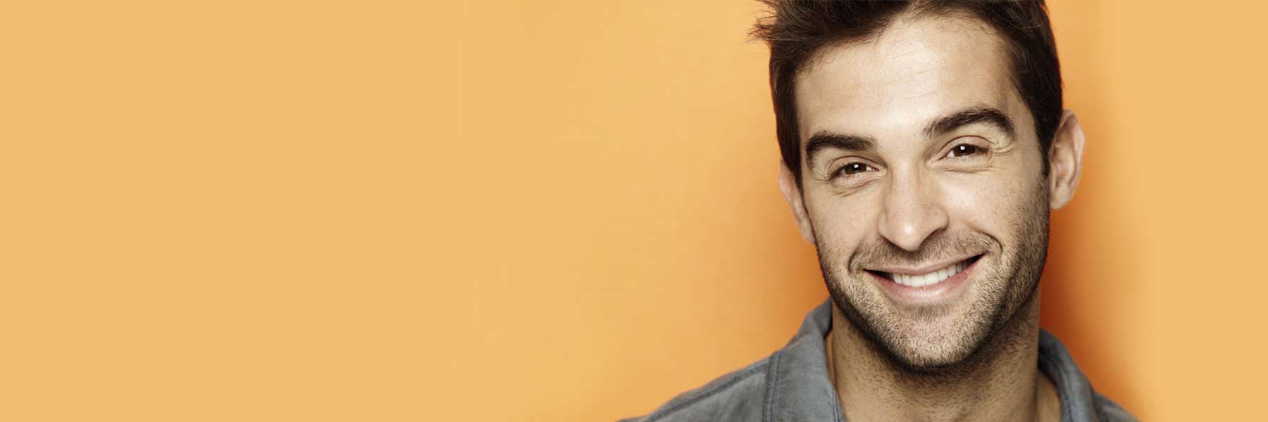 Healthy adults smiling with no pain