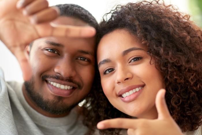 Black man and woman smiling together, winston salem nc