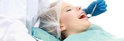 Woman under sedation getting dental work done, winston-salem nc