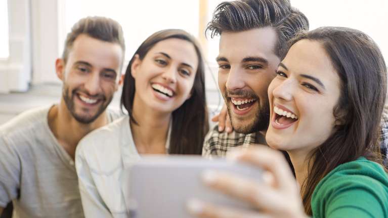 group of friends with dental bonding in winston-salem