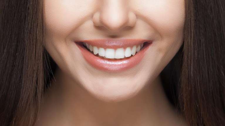 Younger woman with brown hair smiling, winston-salem nc