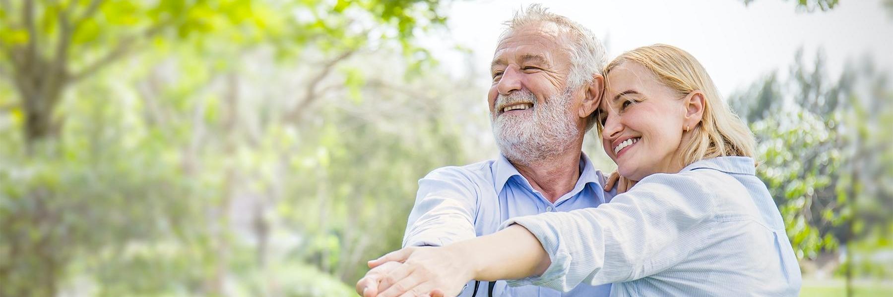 Older man and woman dancing in a park, winston-salem nc