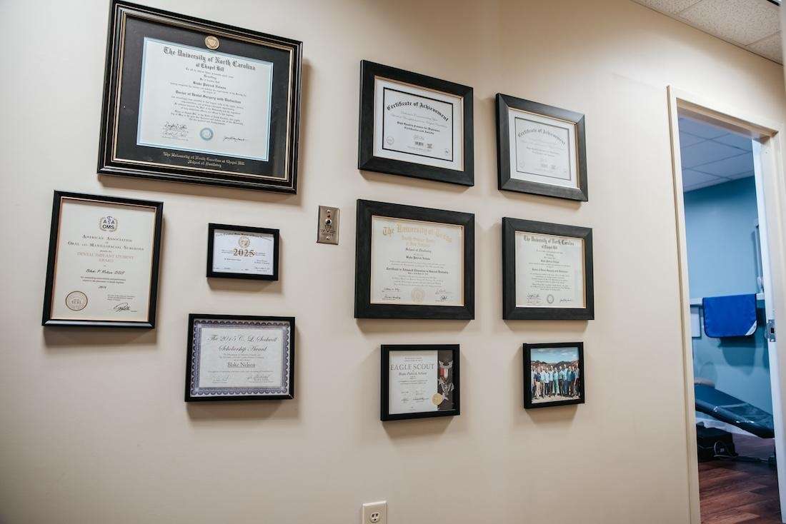 Award wall at blake nelson dds, winston-salem nc